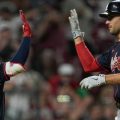 Baseball Bedlam! 16 Runs in One Inning: Braves Edge Reds in Wild Game